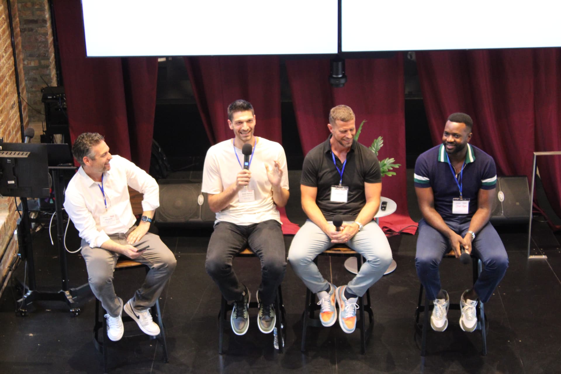 Four panelists on stage at Chicago Sports Tech Week
