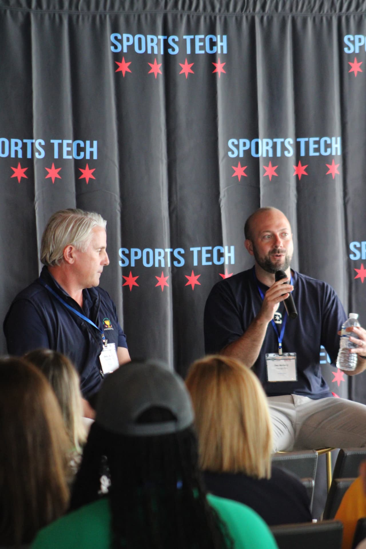 Fireside chat on stage at Chicago Sports Tech Week