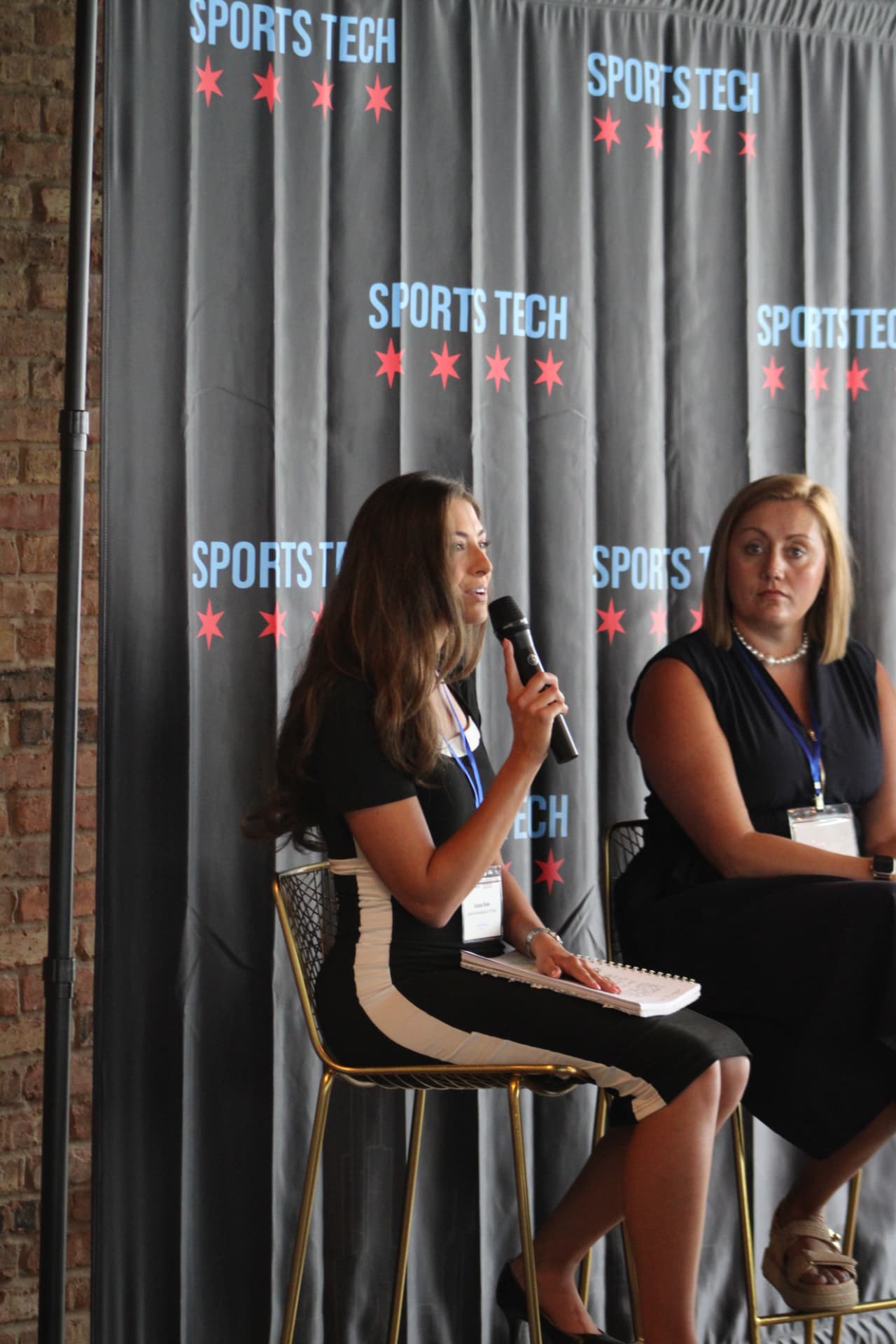 Panelist speaking on the Women's Sports Day panel